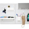 Pegboard placed in the entryway, holding frequently used items for going out.