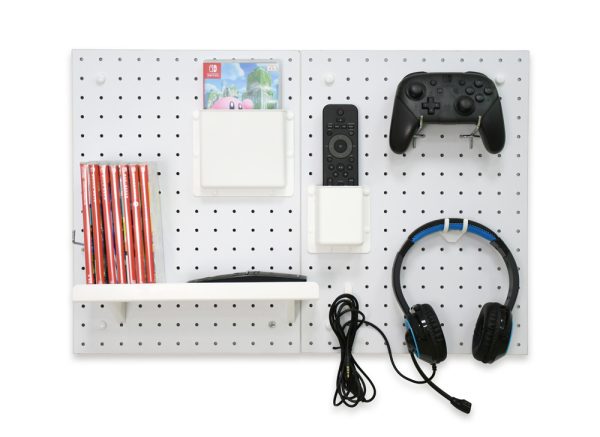 Pegboard used to organize and store gaming accessories.